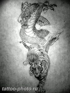 фото тату тигр и дракон 07.12.2018 №001 - tattoo tiger and dragon - tattoo-photo.ru
